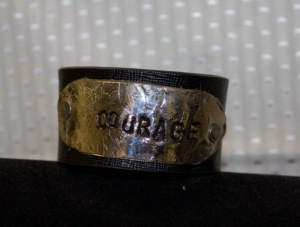 Upcycled and recycled belts and metals converted to handcuff bracelet -COURAGE