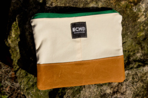 Upcycle and recycled clothing converted to clutch bag at echohandmade.org