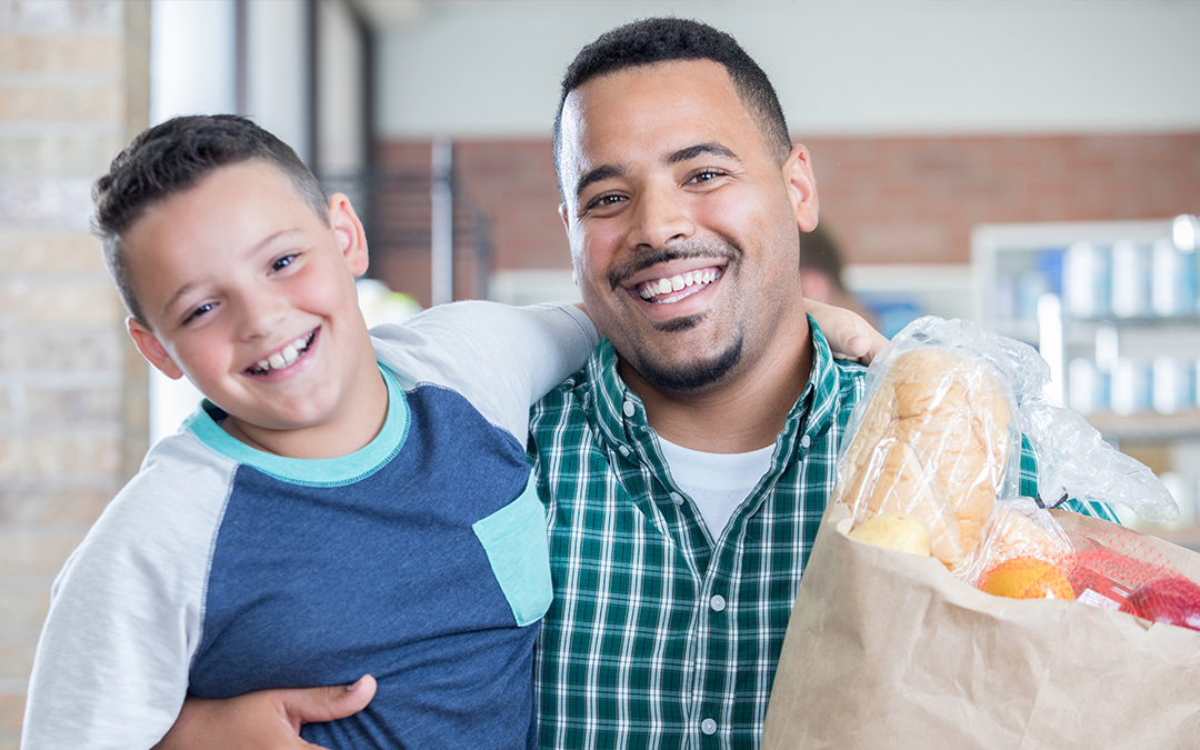 Father and son - get food from ECHO food bank